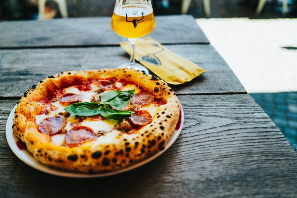 Pizza with beer. As classic as it gets.